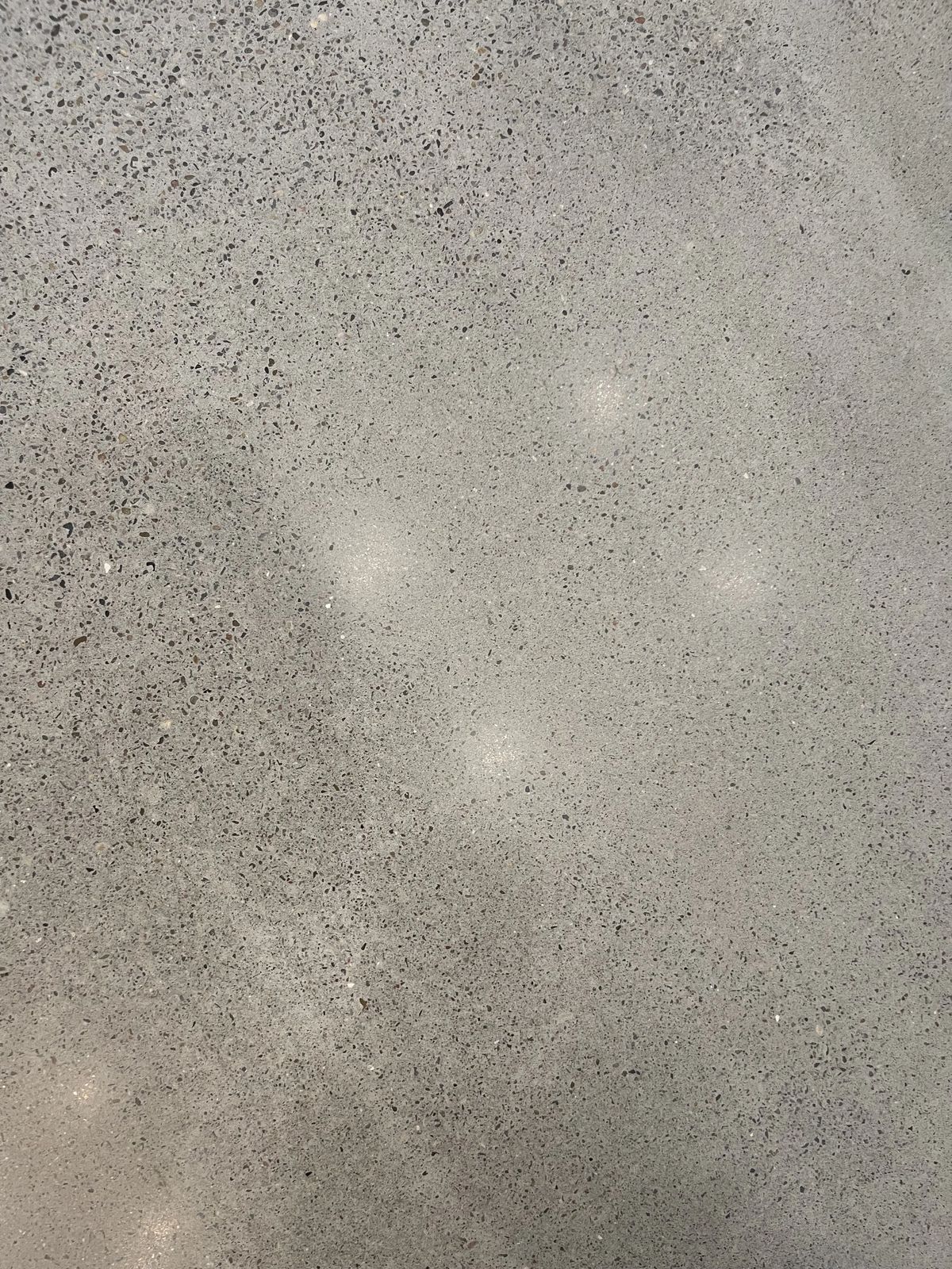 Close-up of polyaspartic flake floor coating installed in Albuquerque, NM